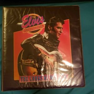 Vintage Elvis Presley collector cards in binder